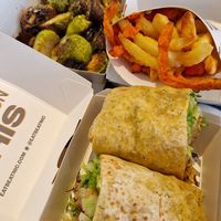 Chicken wrap, 50/50 fries and broccoli at Beatnic - Soho in New York City