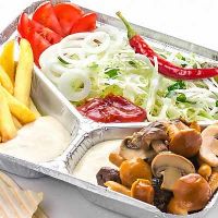 plate with mushrooms and veggies at Star Kebab in Chisinau
