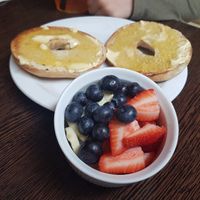 Toasted bagel with fresh fruit at Moose Coffee in Manchester