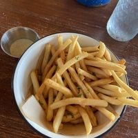 Fries with a really yummy cilantro sauce  at The Wild Chive in Long Beach