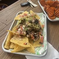Crispy black bean and quinoa nachos and sweet potato fries.   at Branch Out in Paducah