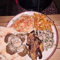 Falafel plate with eggplant, black eyed beans, pumpkin, hummus at The Chickpea in Crete