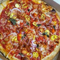 Large (14 in.) build your own - red sauce, v. chorizo, v. cheese, roasted red peppers, red onion, banana peppers, cherry tomatoes, & fresh basil at Blaze Pizza in Canton