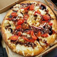 11 inch, high rise, vegan cheese, vegan chorizo, roasted red peppers, red onion, cherry tomatoes and a balsamic glaze at Blaze Pizza in Canton
