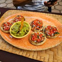 Sopesitos. Small corn Mada tarts stuffed with beans and pico de gallon salsa at Mi Loreto in Loreto