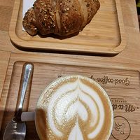 Oatmilk cappuccino and citrus croissant (vegan) at Madal Coffee Co - Ferenciek Tere in Budapest