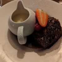 Sticky gingerbread and pear cake with vegan custard at The Walnut Tree in Eye