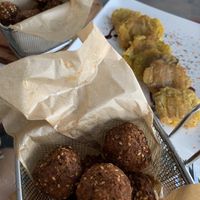 Falafel and tostones. Falafels comes with honey, ask without if you wish vegan dish.  at Azucar Lounge in Havana