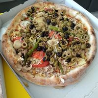 a lot of stuff on pizza at Pizzeria Doomsday in Zagreb