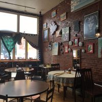 Eclectic decor. Lots of local art and a plastic dinosaur at almost every table at Gooseberries in St Louis