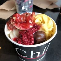 Vegan Mango Sorbet and Vanilla Yogurt w/ rhurb pie, raspberry and chocolate/peanut butter ball toppings at Chil Organic Frozen Yogurt Bar in London