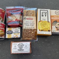 Big Franks! San Diego tempeh & mushroom 🍄 stew! Hard to find vegan options!  at San Diego Vegan Market in San Diego