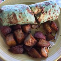 Breakfast burrito with potatoes. Delicious! at The Grain Cafe in Long Beach