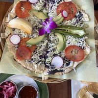 Oaxaqueño tlayuda - Omni approved, salad could have been fresher but still good!   at The Grain Cafe in Long Beach