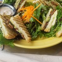 Club sandwich with salad at The Grain Cafe in Long Beach