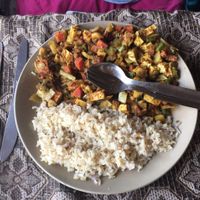 tofu curry with brown rice  at Tip Top Restaurant in Rishikesh