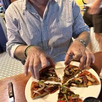 Half way thru the vegan pizza   at El Centro in Kota Kinabalu