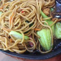 Noodles on hot plate at Alpukat Bistro in Jakarta