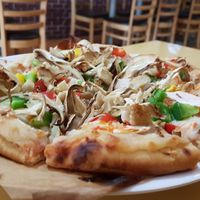 Pizza 6$ (taste a bit sweet) at Loving Hut Thai Duong in Phu Quoc