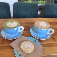Coffee, match, and an Italian cookie   at Green Table Cafe in Los Angeles