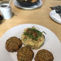 zucchini burgers with potato salad at Black Kale in Ostrava