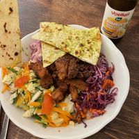 Shwarma bowl & kombucha - there was so much more rice and salad under here that you can’t see!  at Sandokan Vegan Bistro in Prague