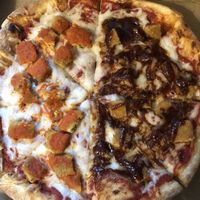 Half Vegan Buffalo Ch’ckn and half Vegan BBQ Ch’ckn. YUMMM!!! at Pizza Palace in Milford