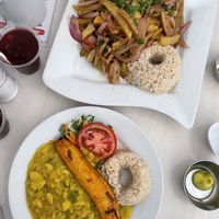 Lomo saltado & “ajiaco de olluco” (stewed root veg) with plantain and rice  at Vegetalia in Lima