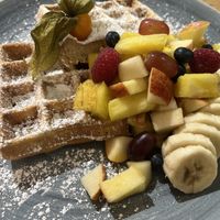 Vanilla waffles with fruit   at Green Leaf Cafe in Erding