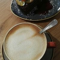 Cappuccino mit Hafermilch at Green Leaf Cafe in Erding