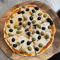 Vegan pizza with my favorite toppings, green and black olives   at La Matatena Pizzeria in Oaxaca