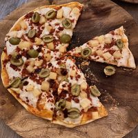 Large pizza with soy chorizo, olives, pineapple and vegan cheese   at La Matatena Pizzeria in Oaxaca