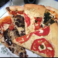 vegan caprese, spinaci, and Verona pizzas for takeout! at Stagecoach Place Cafe in Crossville