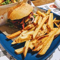 Beet burger and fries (burrito bowl in background) at Marta's Veggie Fusion in Split