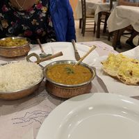 Dal tarka, aloo gobi, boiled rice, and garlic naan  at Jaipur Palace in Santorini