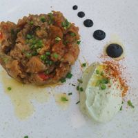 Eggplant starter dish with condiments at Totum Cantine Bio in Nantes