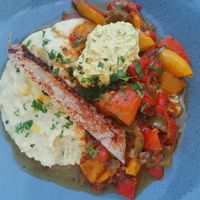 Main dish with polenta, bell peppers, and an "eggy" smoky tofu paste at Totum Cantine Bio in Nantes