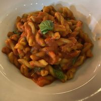 Spinach pasta with tomato sauce and basil  at Pastaus in Valletta