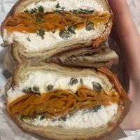 Edith on a croissant — their cc is the best  at Orchard Grocer in New York City