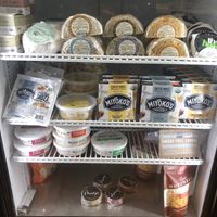 The cheese fridge at Orchard Grocer in New York City