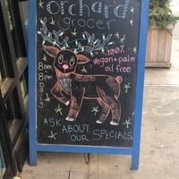 Cute sign outside  at Orchard Grocer in New York City