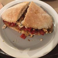 Delicious vegan sandwich with tofu & roasted bell pepper + caramelized onions at La Inquilina in Madrid