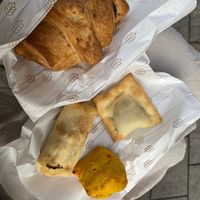 chocolate peanut croissant, mushroom ravioli, spring roll, pumpkin rosemary pogaca at Fill Good in Budapest