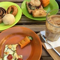 random collection of pastries and iced latte from next door  at Fill Good in Budapest
