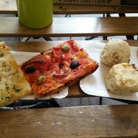 Pizzas and buns thingys at Fill Good in Budapest