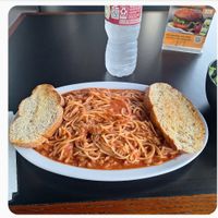 Spaghetti and bread at Sankofa Kitchen in Dallas