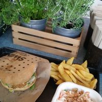 Schnitzel burger, coleslaw and chips at Swing Kitchen - Josefstadt in Vienna