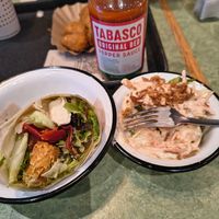 Avocado and crispy vegan bacon wrap with vegan coleslaw. at Swing Kitchen - Josefstadt in Vienna