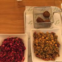 Beet and lentil salads with a side of falafel. at Umi Falafel in Cork