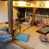 Some of the seating spots, books!  at Cafe Stay Happy in Tokyo